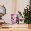 "Imagination is more important than knowledge." Albert Einstein quote mug on stack of books with globe on desk